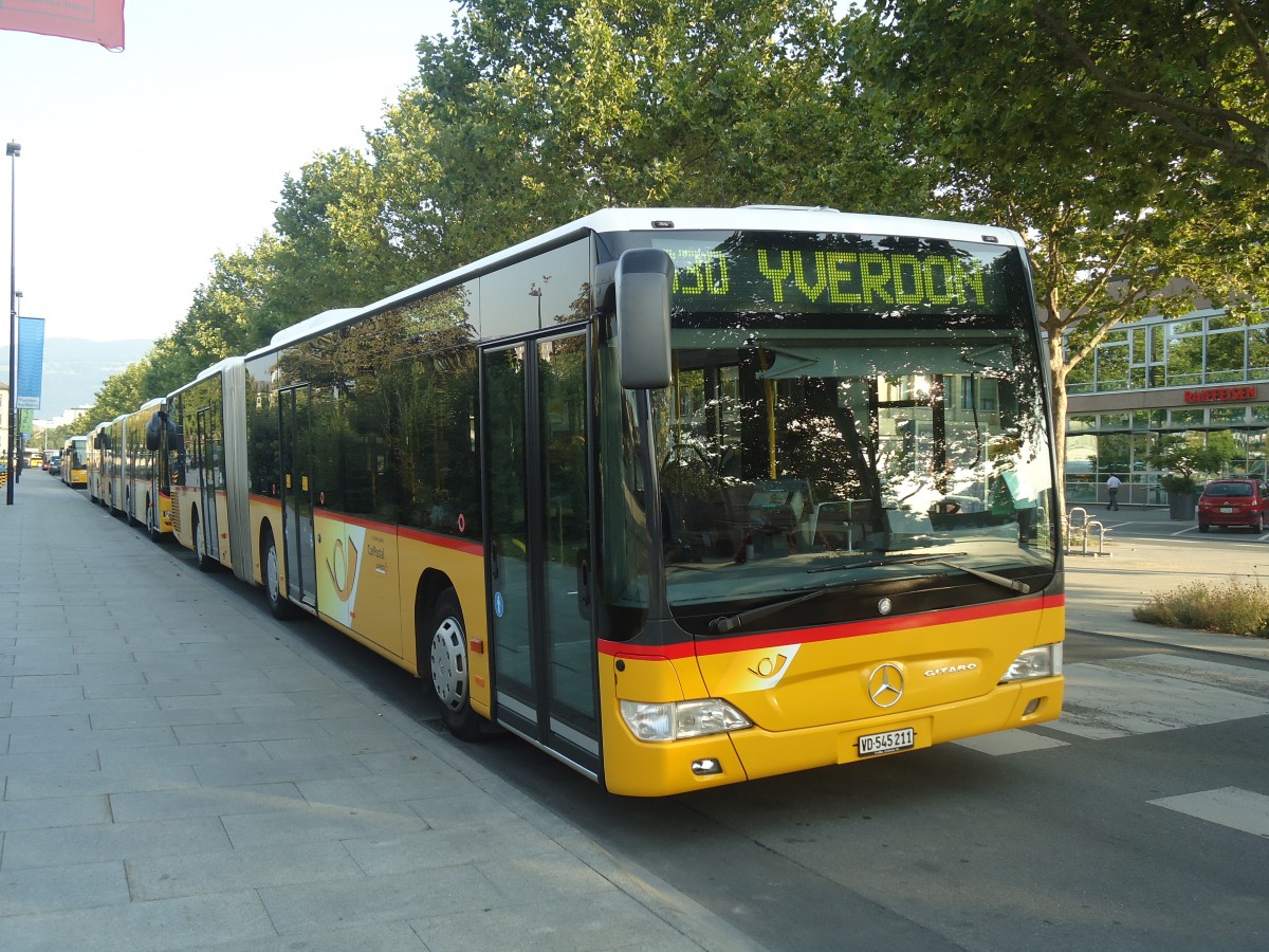 (140'957) - CarPostal Ouest - VD 545'211 - Mercedes am 27. Juli 2012 beim Bahnhof Yverdon