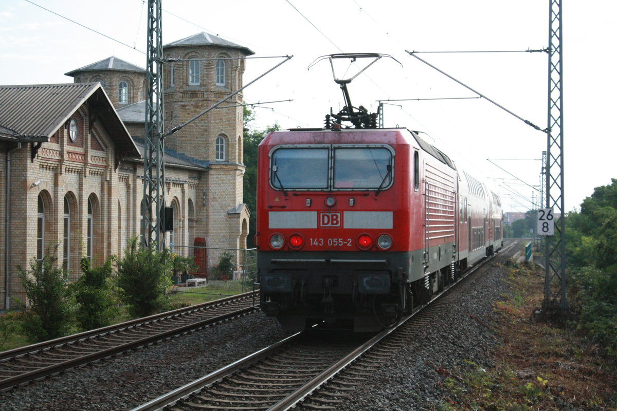 143 055 verlsst als S9 mit ziel Eilenburg den Bahnhof Delitzsch ob Bf am 16.7.20