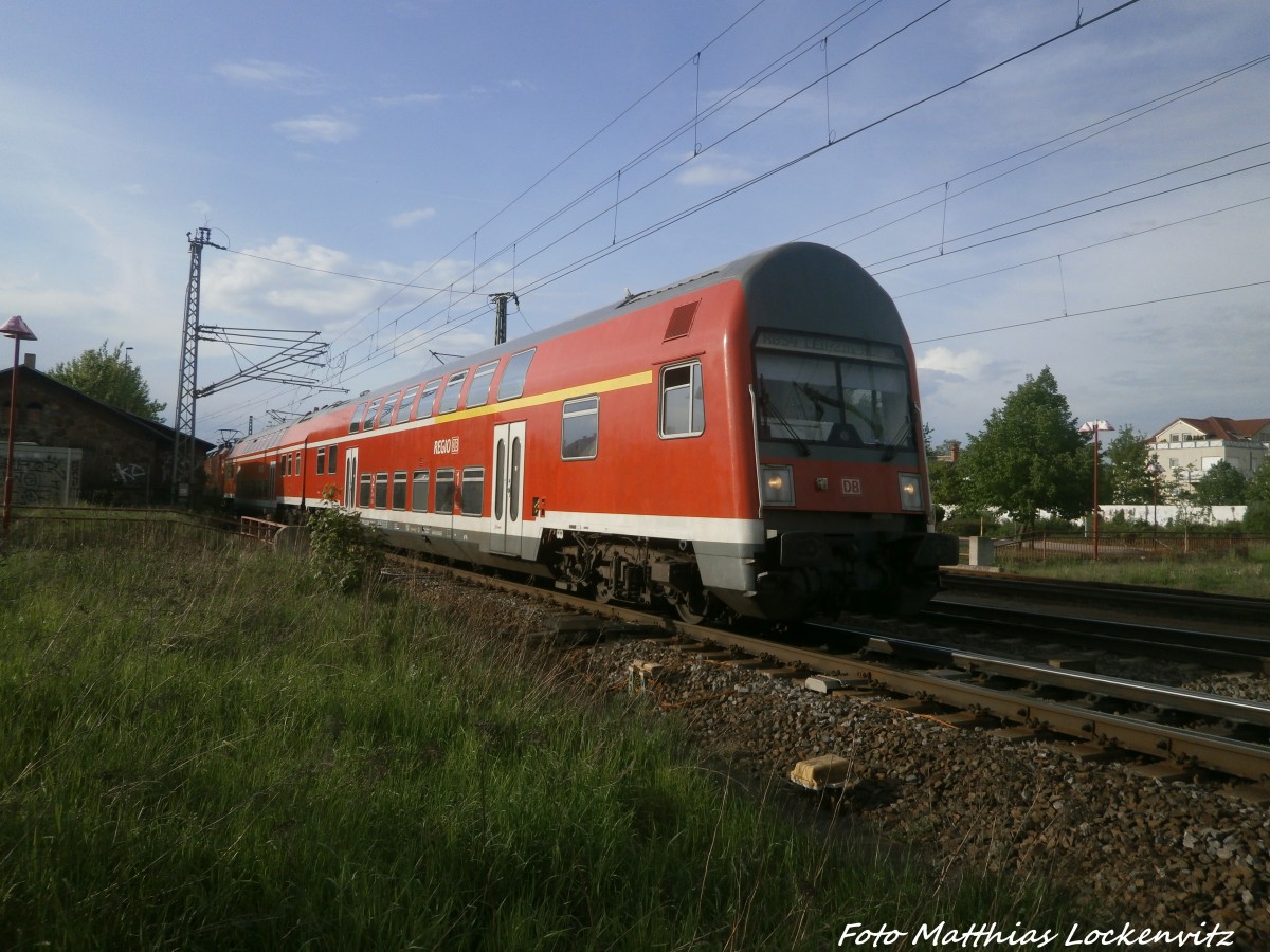 143 857 verlsst Mit Stuerwagen voraus den Bahnhof Delitzsch unt Bf in Richtung Leipzig  Hbf am 9.5.15