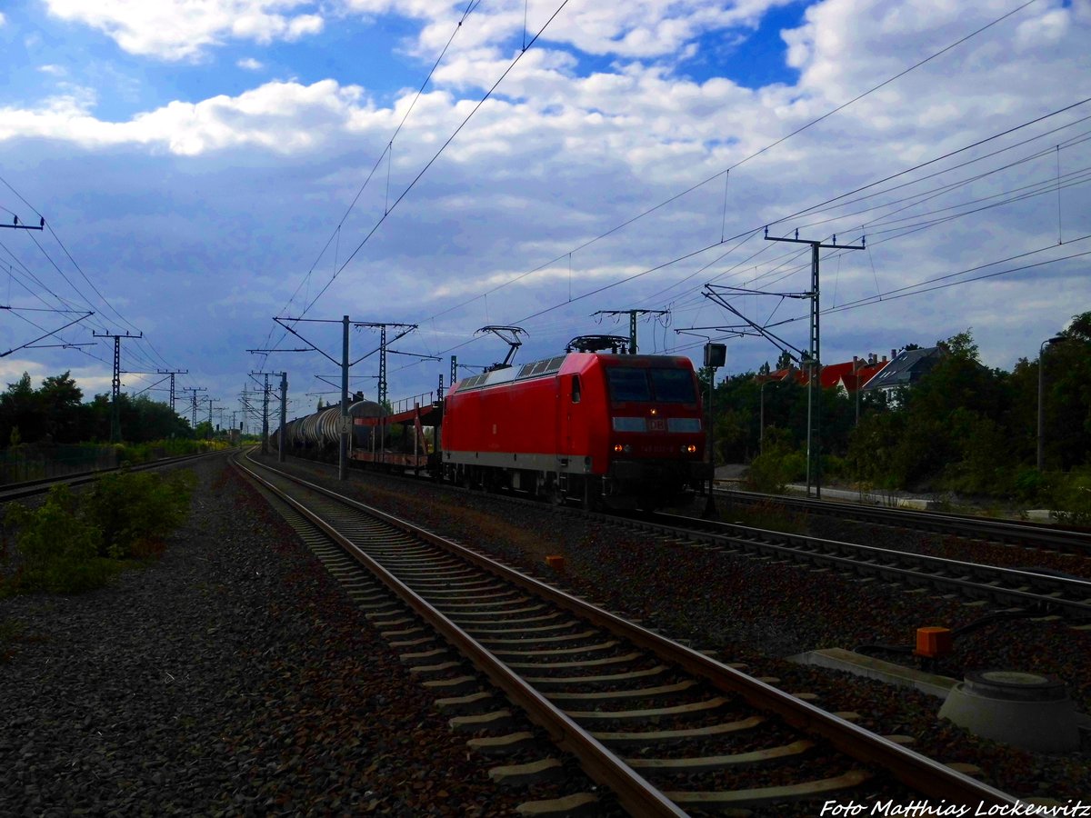 145 032 mit einem Gterzug bei der Durchfahrt am S-Bahnhof Leipzig-Wahren am 9.8.16