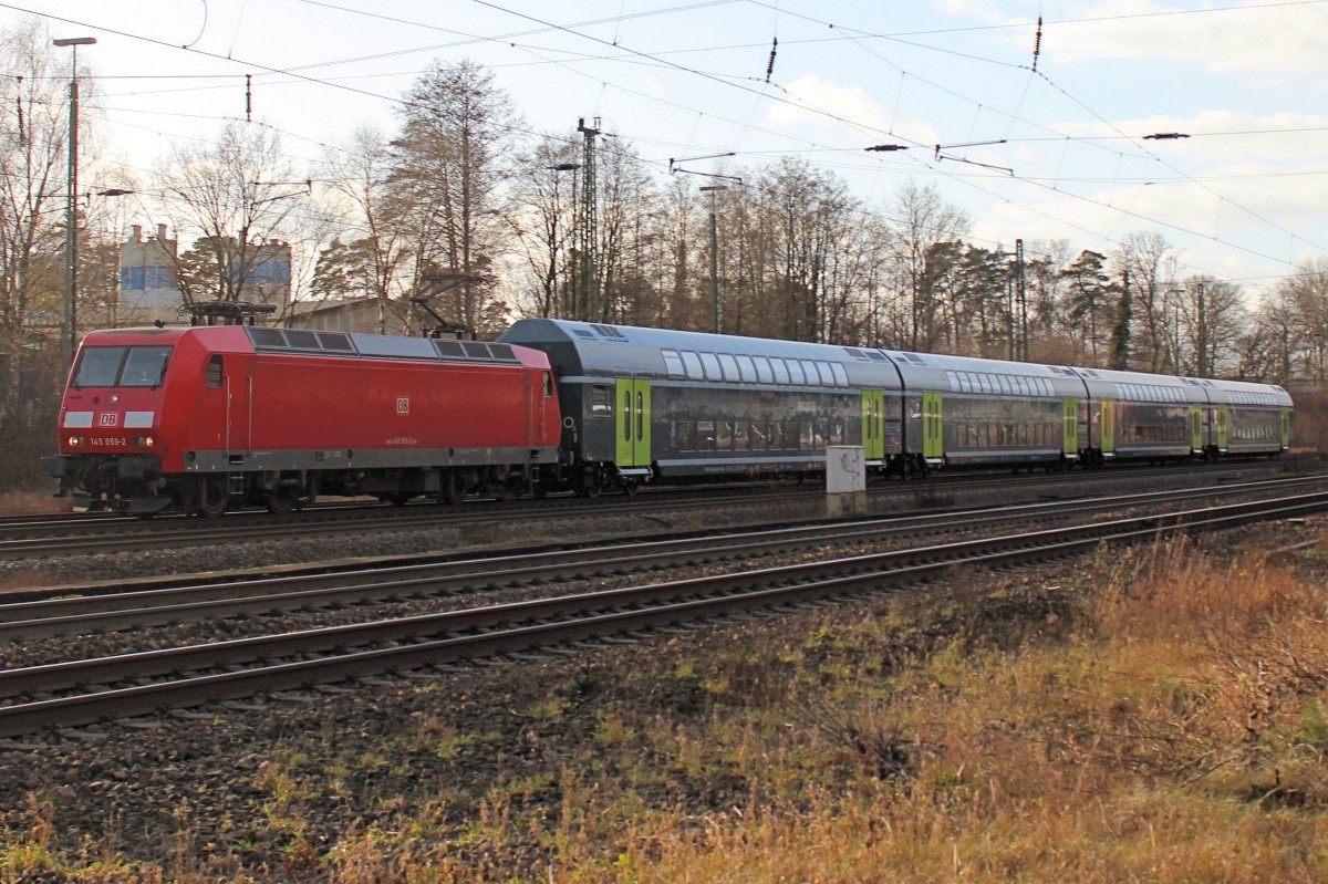 145 059-2 mit vier neuen Bombardier Twindexx - Mittelwagen für DB Regio - Nord, auf den Weg nach Kiel. Aufgenommen in Tostedt am 23.12.2015