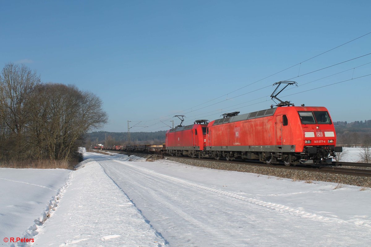 145 077-4 und 145 070-9 ziehen einen leer Zug für Max Bögl bei Pölling. 26.01.17