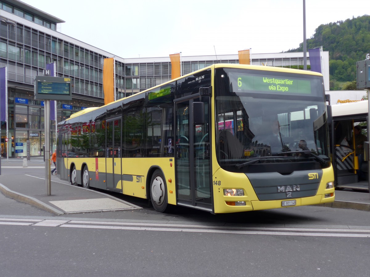 (150'658) - STI Thun - Nr. 148/BE 801'148 - MAN am 14. Mai 2014 beim Bahnhof Thun