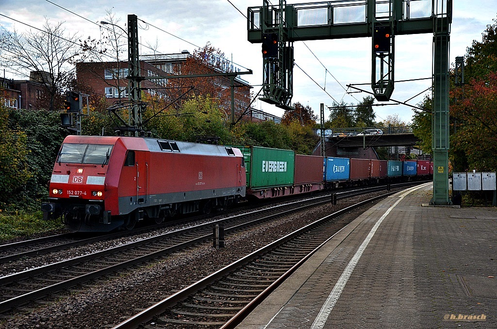 152 077-4 ist mit einen kastenzug durch hh-harburg gefahren,01.11.14