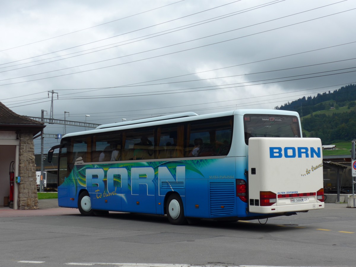 (154'729) - Born, Olten - Nr. 6/AG 14'041 - Setra am 31. August 2014 beim Bahnhof Frutigen