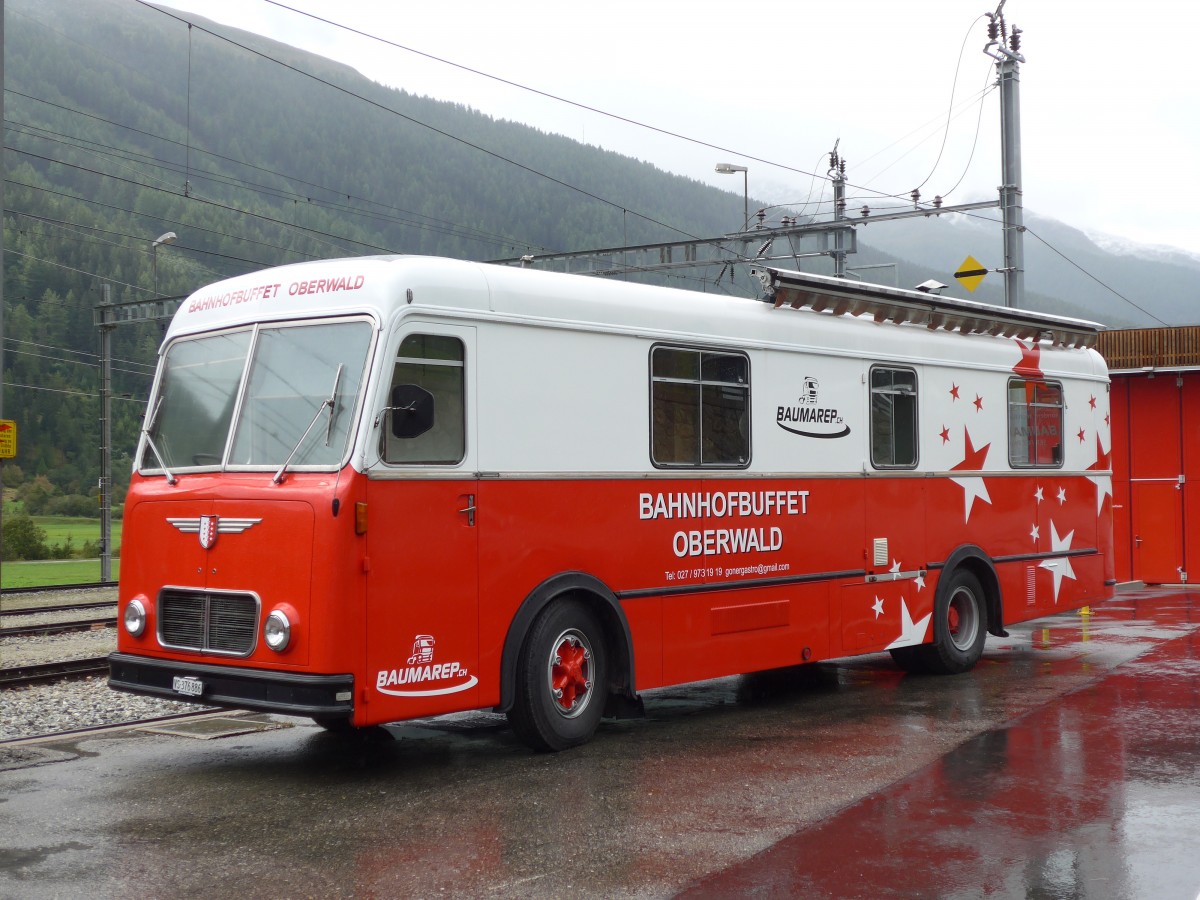 (154'760) - Bahnhofbuffet, Oberwald - VS 376'886 - FBW/Hess (ex Schirmbildwagen, Solothurn) am 1. September 2014 beim Bahnhof Oberwald