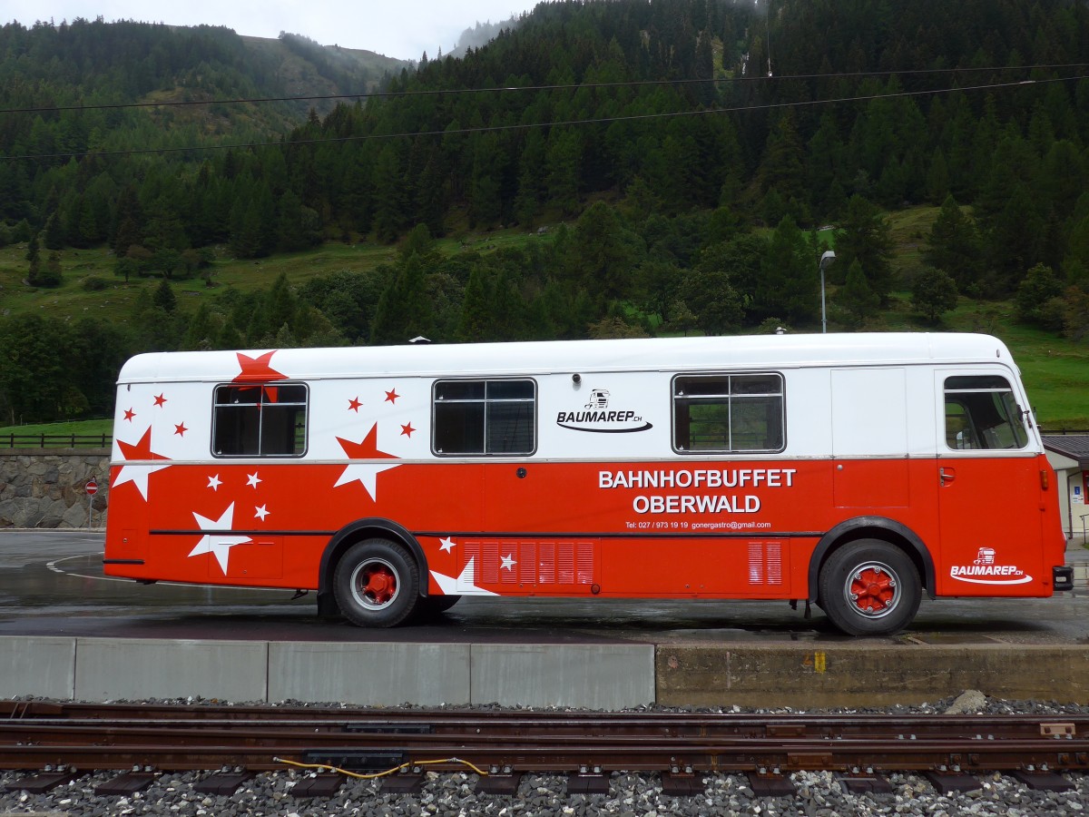 (154'762) - Bahnhofbuffet, Oberwald - VS 376'886 - FBW/Hess (ex Schirmbildwagen, Solothurn) am 1. September 2014 beim Bahnhof Oberwald