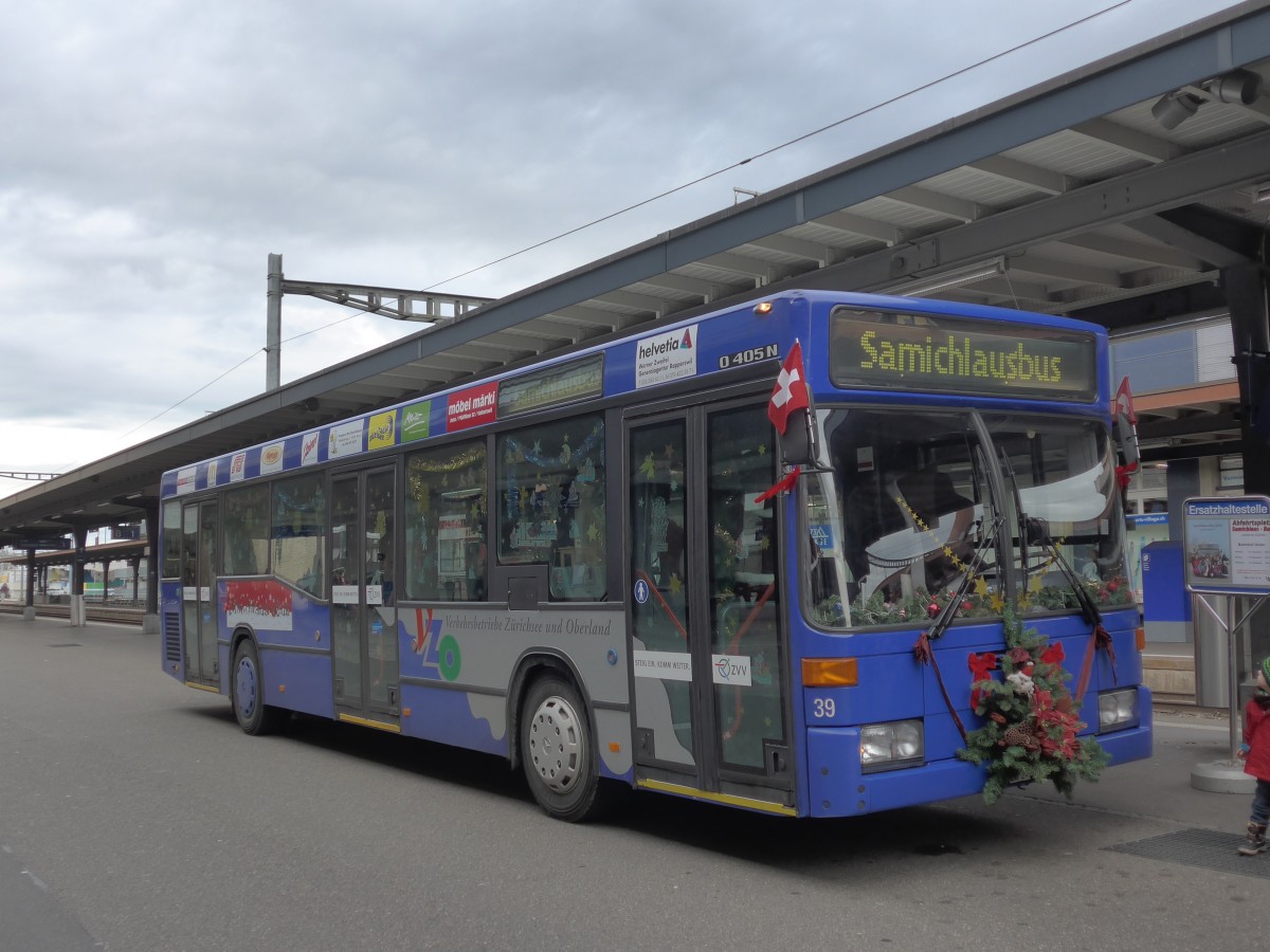 (157'770) - VZO Grningen - Nr. 39/ZH 242'853 - Mercedes (ex Schneider, Meilen Nr. 7) am 14. Dezember 2014 beim Bahnhof Uster