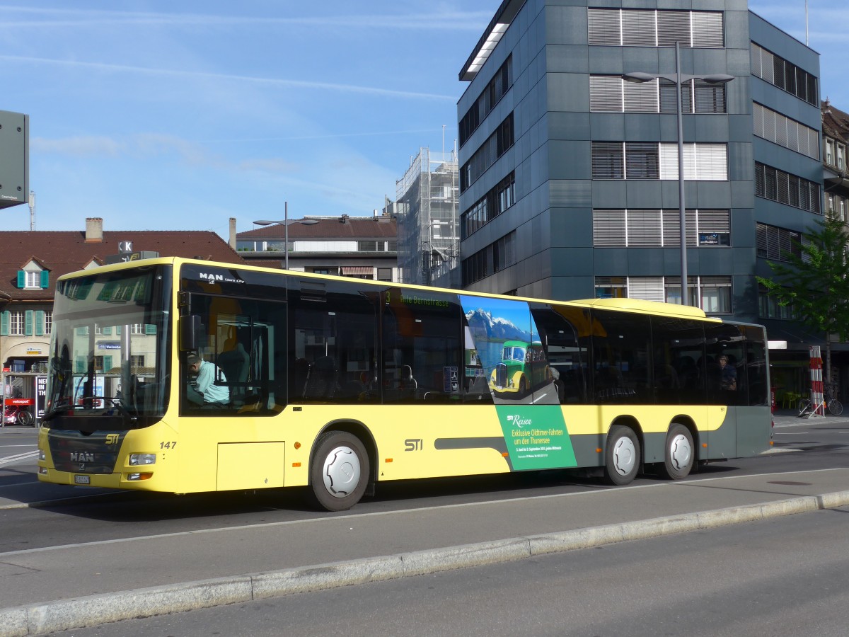 (160'230) - STI Thun - Nr. 147/BE 801'147 - MAN am 9. Mai 2015 beim Bahnhof Thun