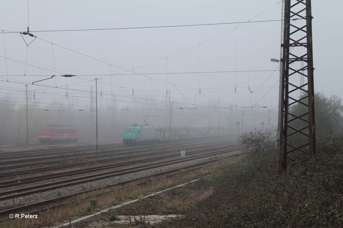 185 611-1 vermietet an ITL mit einem leeren BLG-Autozug in Leipzig Schönefeld. 29.03.14