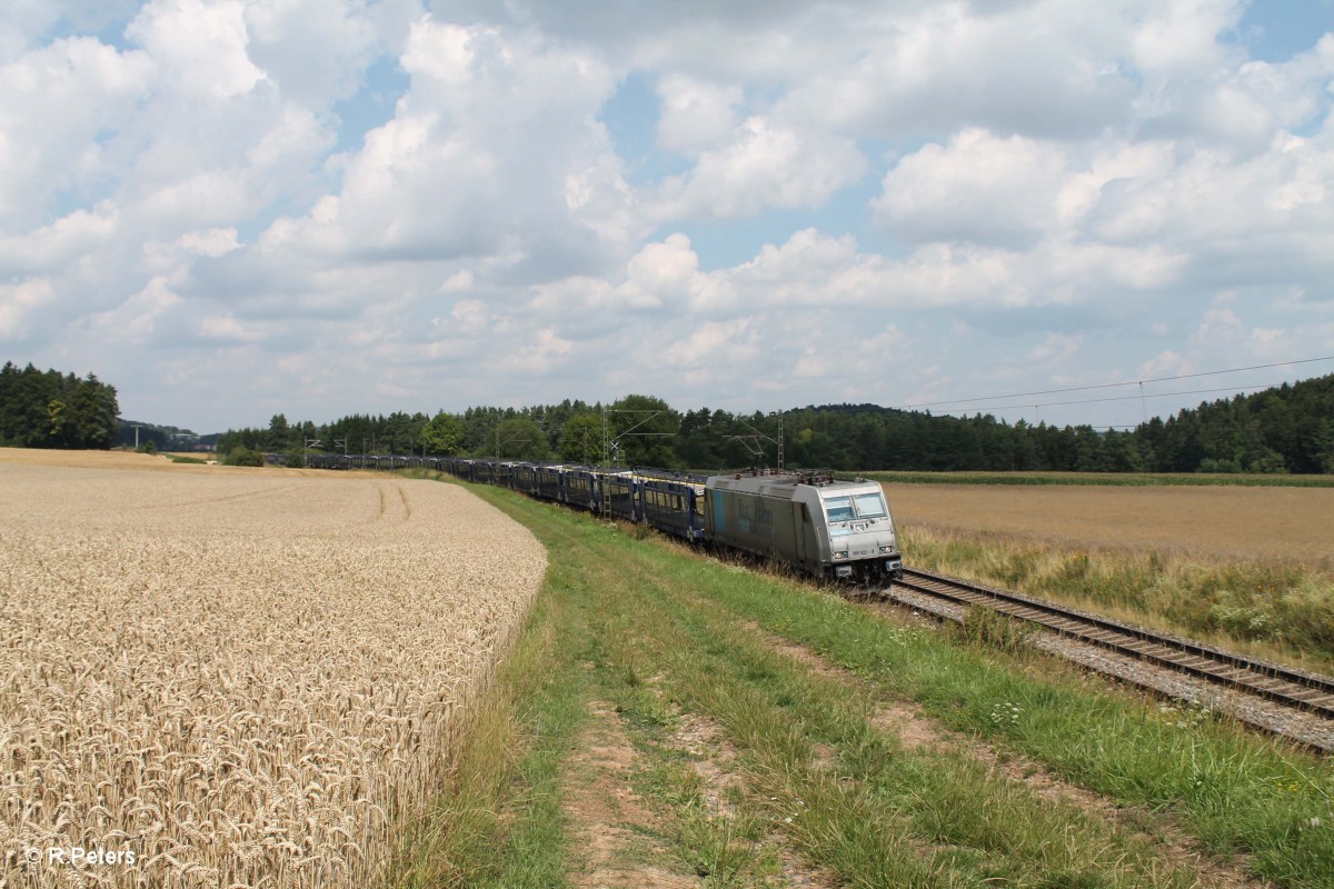 185 622-8 alias 119 003 mit einem leeren Autotransportzug bei Dettenhofen. 25.07.14