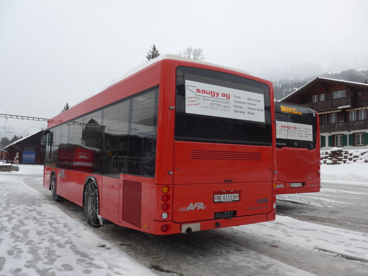 (186'942) - AFA Adelboden - Nr. 56/BE 611'030 - Scania/Hess am 10. Dezember 2017 beim Bahnhof Lenk