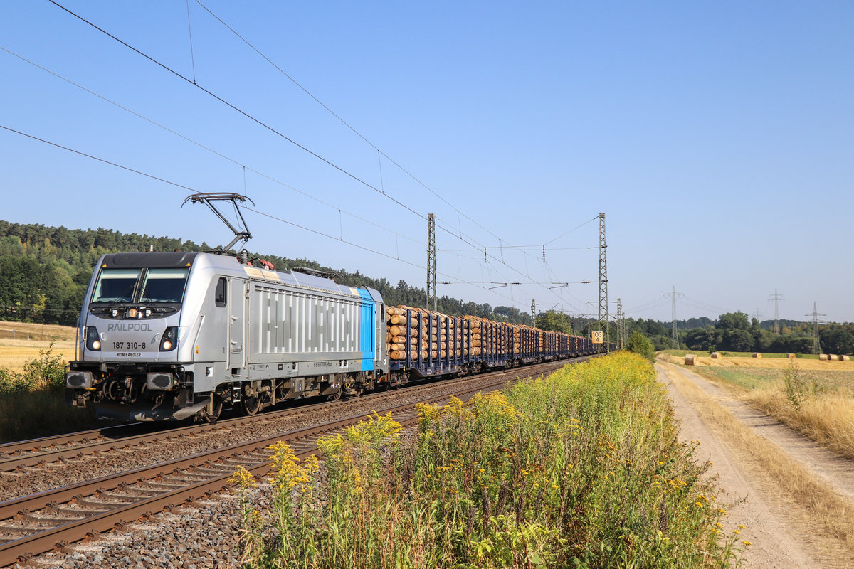 187 310 mit einem Holzzug am 03.08.18 in Kerzell