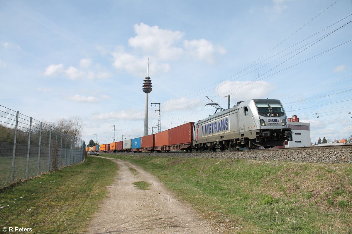 187 513-7 mit einem Containerzug in der Treuchtlinger Kurve in Nürnberg Hohe Marter. 25.03.25