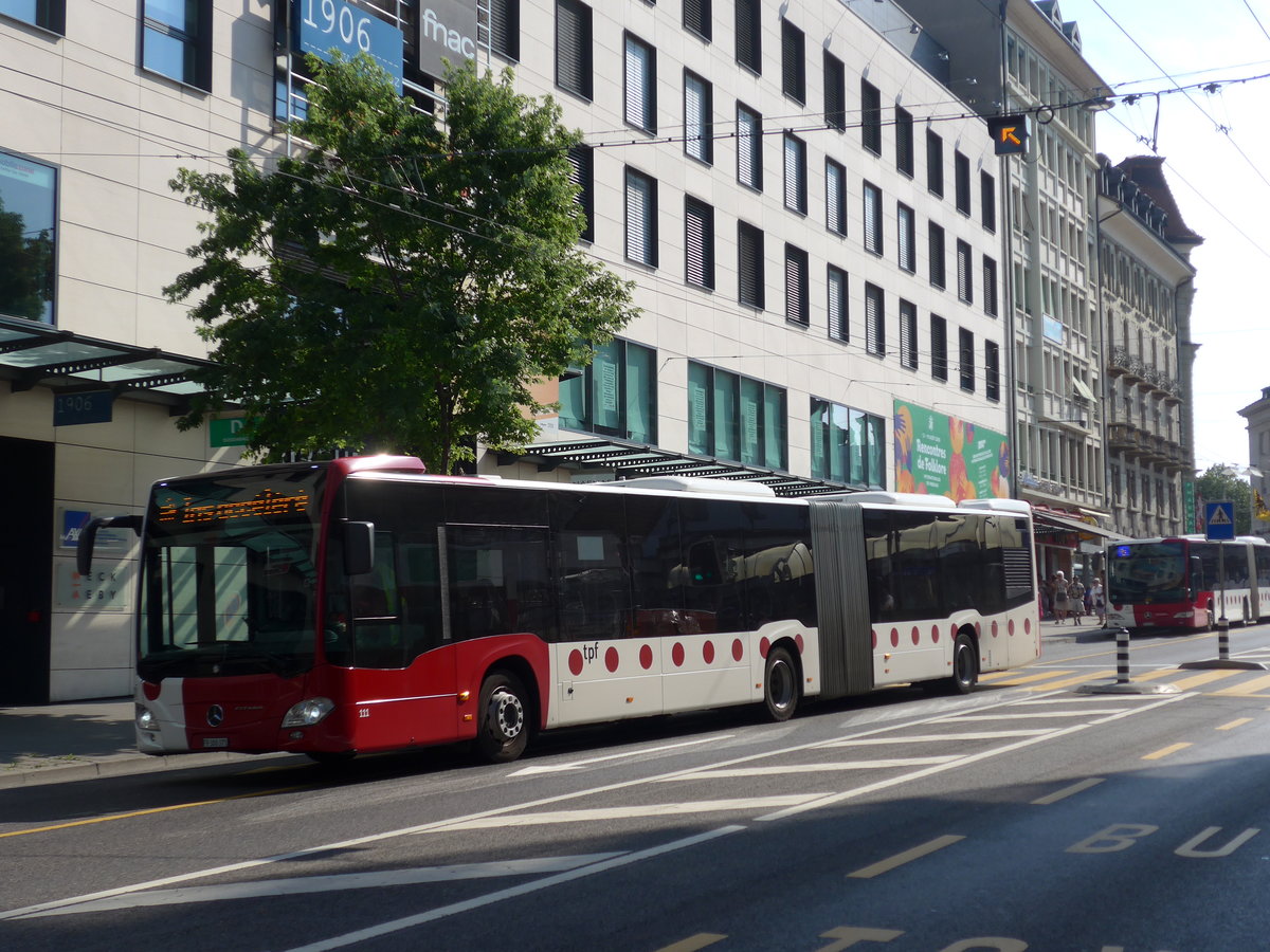 (195'646) - TPF Fribourg - Nr. 111/FR 300'371 - Mercedes am 5. August 2018 beim Bahnhof Fribourg