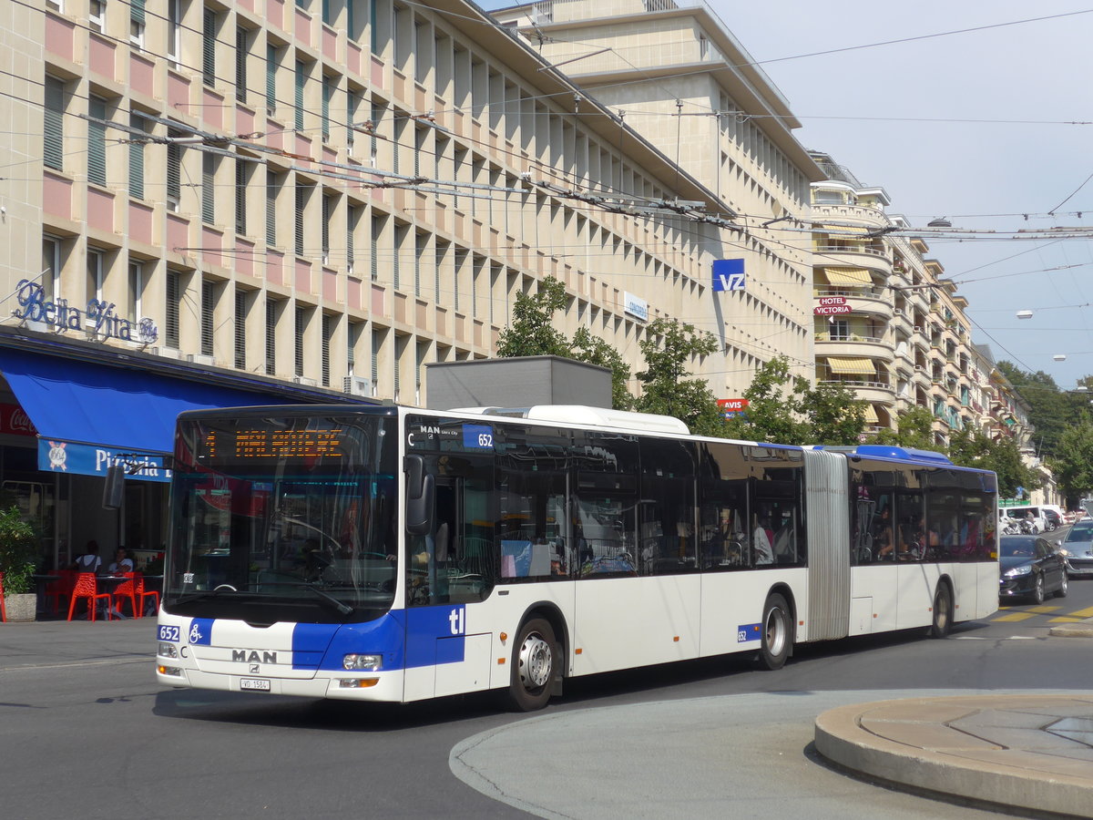 (195'777) - TL Lausanne - Nr. 652/VD 1584 - MAN am 6. August 2018 beim Bahnhof Lausanne