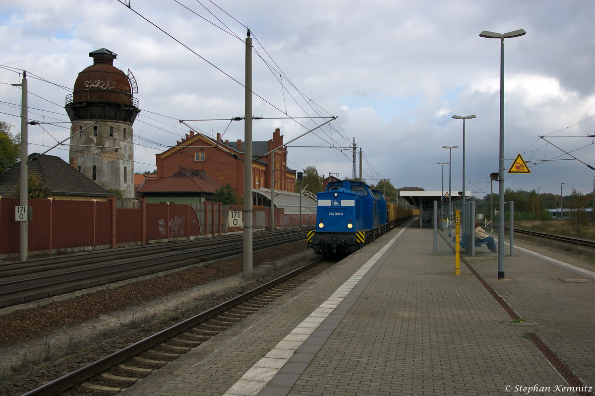 204 009-9 PRESS (202 439-6) & 204 012-4 PRESS (203 215-9) mit einem Holzzug, bei der Durchfahrt in Rathenow und fuhren in Richtung Stendal weiter. 17.10.2014