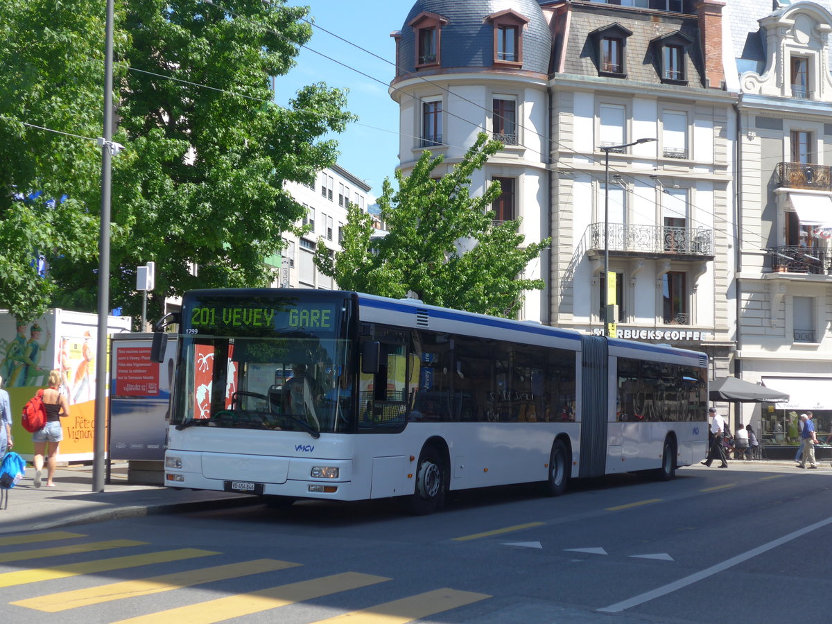 (208'469) - VMCV Clarens - Nr. 906/VD 454'846 - MAN (ex transN, La Chaux-de-Fonds Nr. 243; ex TN Neuchtel Nr. 243) am 4. August 2019 beim Bahnhof Vevey