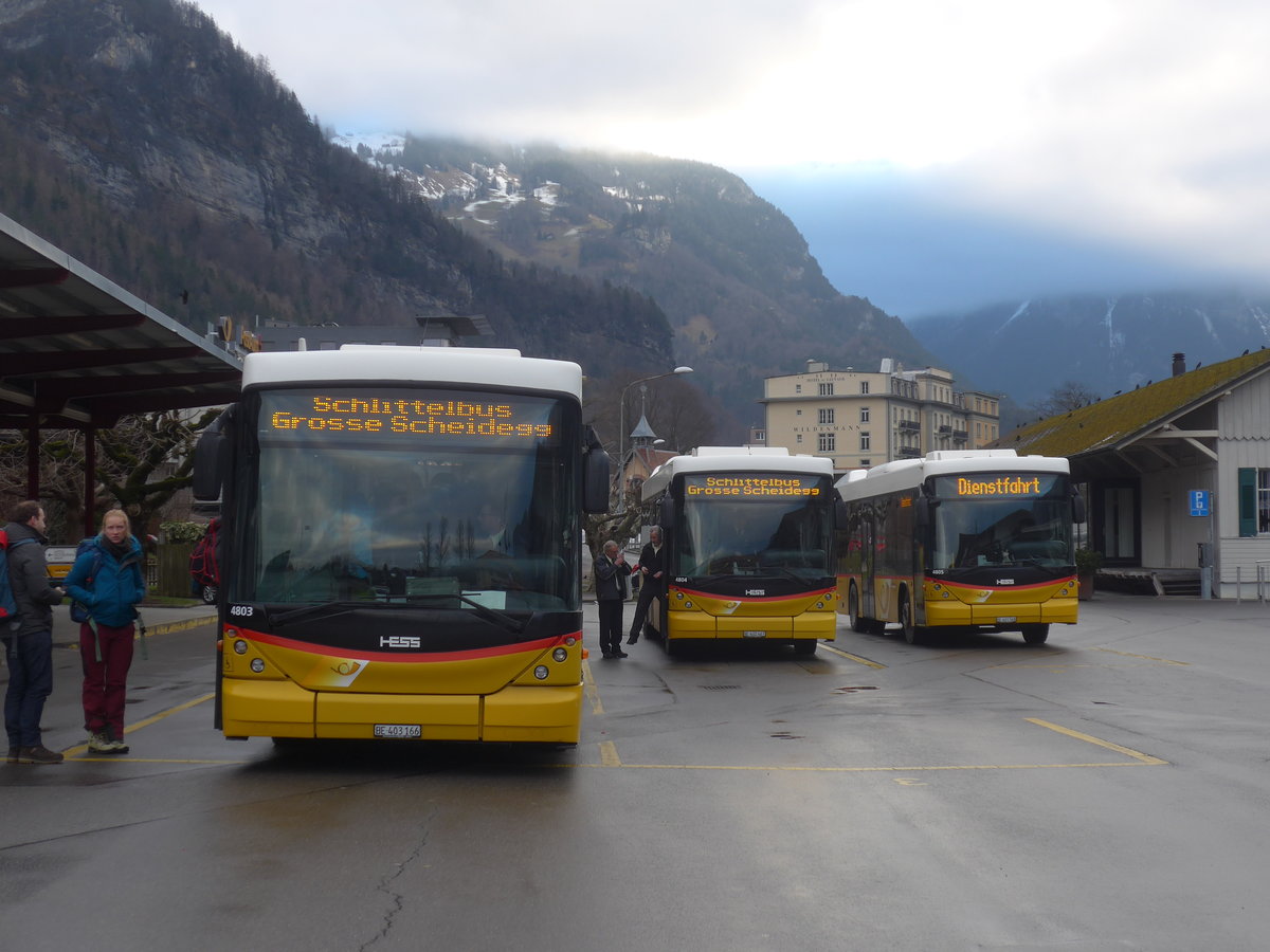 (213'389) - PostAuto Bern - BE 403'166 - Scania/Hess (ex AVG Meiringen Nr. 66; ex Steiner, Messen) + BE 402'467 - Scania/Hess (ex AVG Meiringen Nr. 67; ex AVG Meiringen Nr. 76; ex Steiner, Messen) + BE 401'568 - Scania/Hess (ex AVG Meiringen Nr. 68; ex AVG Meiringen Nr. 59; ex Steiner, Messen) am 5. Januar 2020 in Meiringen, Postautostation