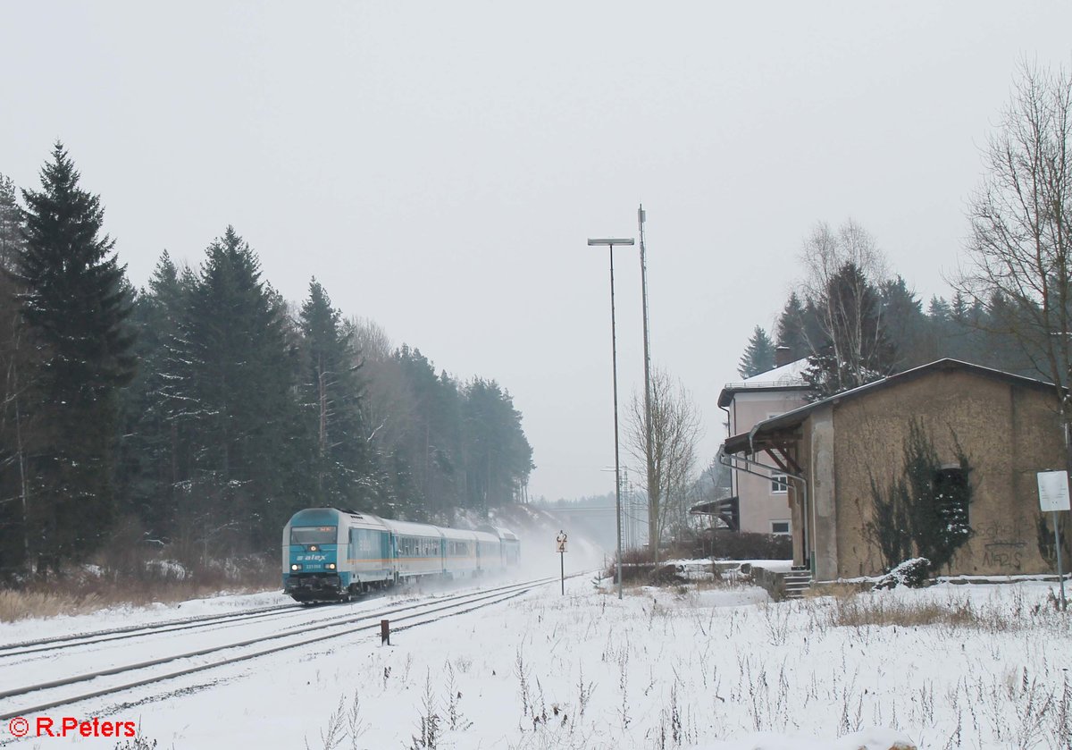 223 069 mit dem ALX84104 München - Hof bei der durchfahrt in Rößlau. 11.01.17