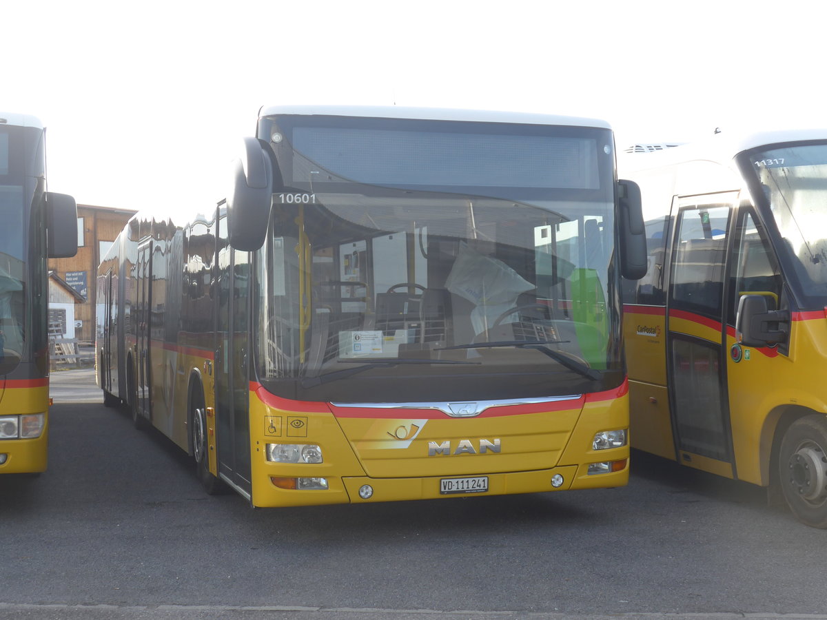 (223'089) - CarPostal Ouest - VD 111'241 - MAN am 26. Dezember 2020 in Kerzers, Interbus