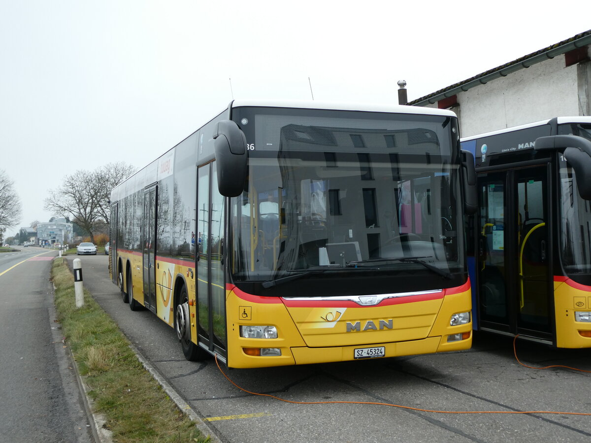 (230'850) - Lienert&Ehrler, Einsiedeln - SZ 45'324 - MAN (ex Schuler, Feusisberg) am 21. November 2021 in Pfffikon, Garage