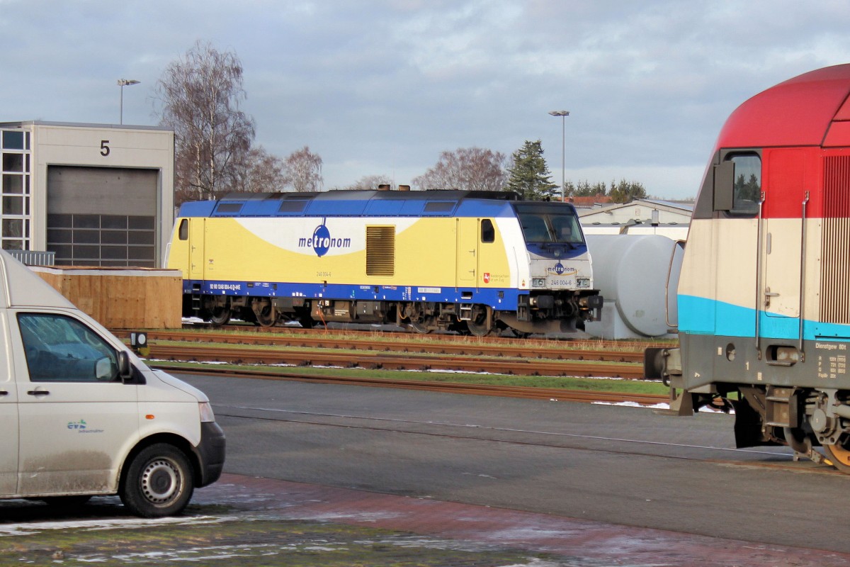 246 004-6 am 09.01.2016 in Bremervörde - EVB Betriebshof. Im Vordergrund evb Logistik 223 031 (ex 420 11).