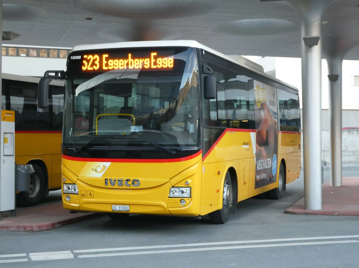 (246'002) - BUS-trans, Visp - VS 97'000/PID 10'088 - Iveco am 11. Februar 2023 beim Bahnhof Visp