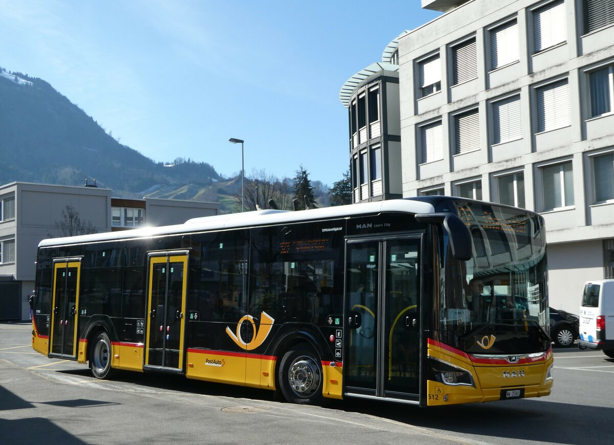 (246'182) - PostAuto Zentralschweiz - Nr. 512/NW 25'361/PID 11'905 - MAN am 16. Februar 2023 beim Bahnhof Stans