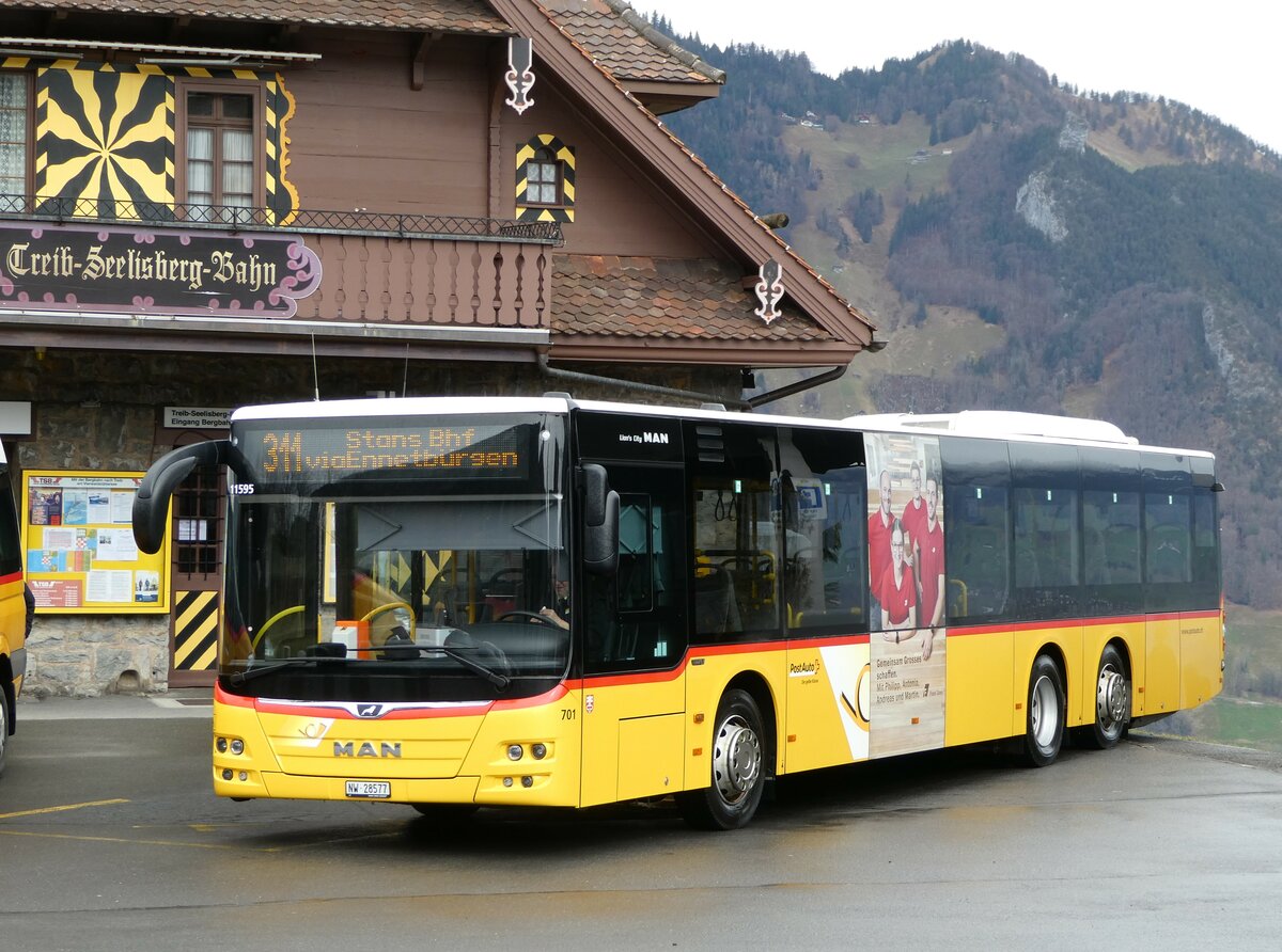 (247'079) - PostAuto Zentralschweiz - Nr. 701/NW 28'577/PID 11'595 - MAN (ex Nr. 71) am 10. März 2023 beim Bahnhof Seelisberg