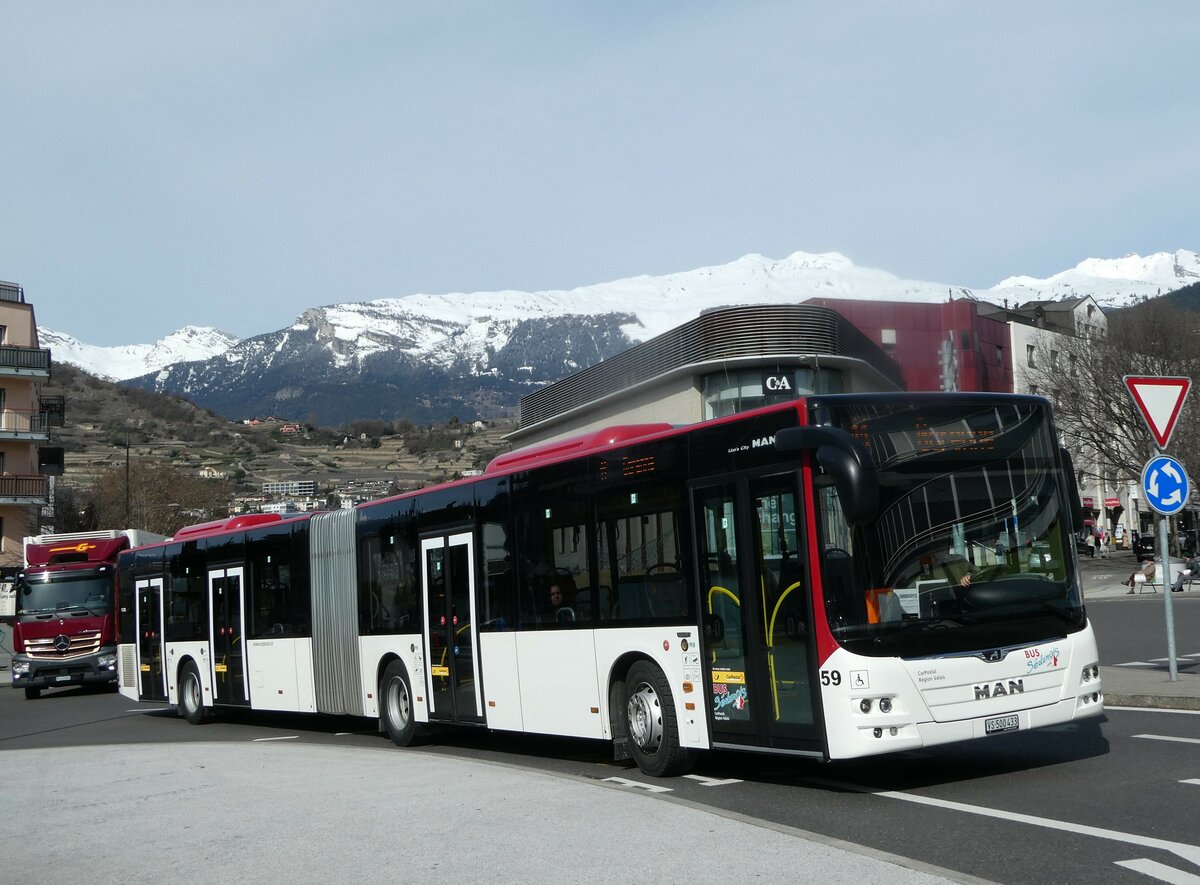 (247'225) - PostAuto Wallis - Nr. 59/VS 500'433/PID 11'208 - MAN am 16. Mrz 2023 beim Bahnhof Sion