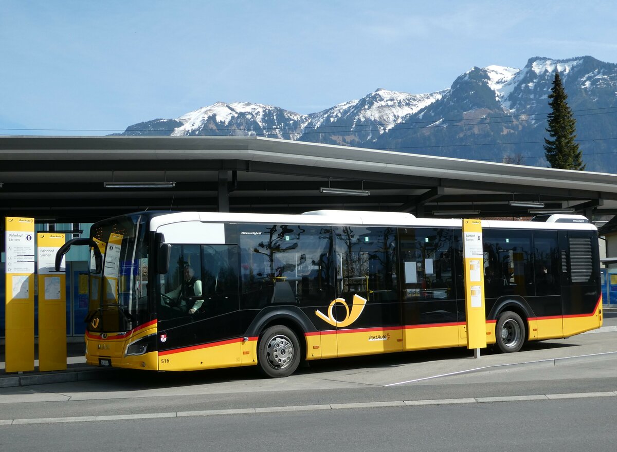 (247'424) - PostAuto Zentralschweiz - Nr. 516/OW 40'016/PID 11'747 - MAN (ex Nr. 16) am 18. Mrz 2023 beim Bahnhof Sarnen