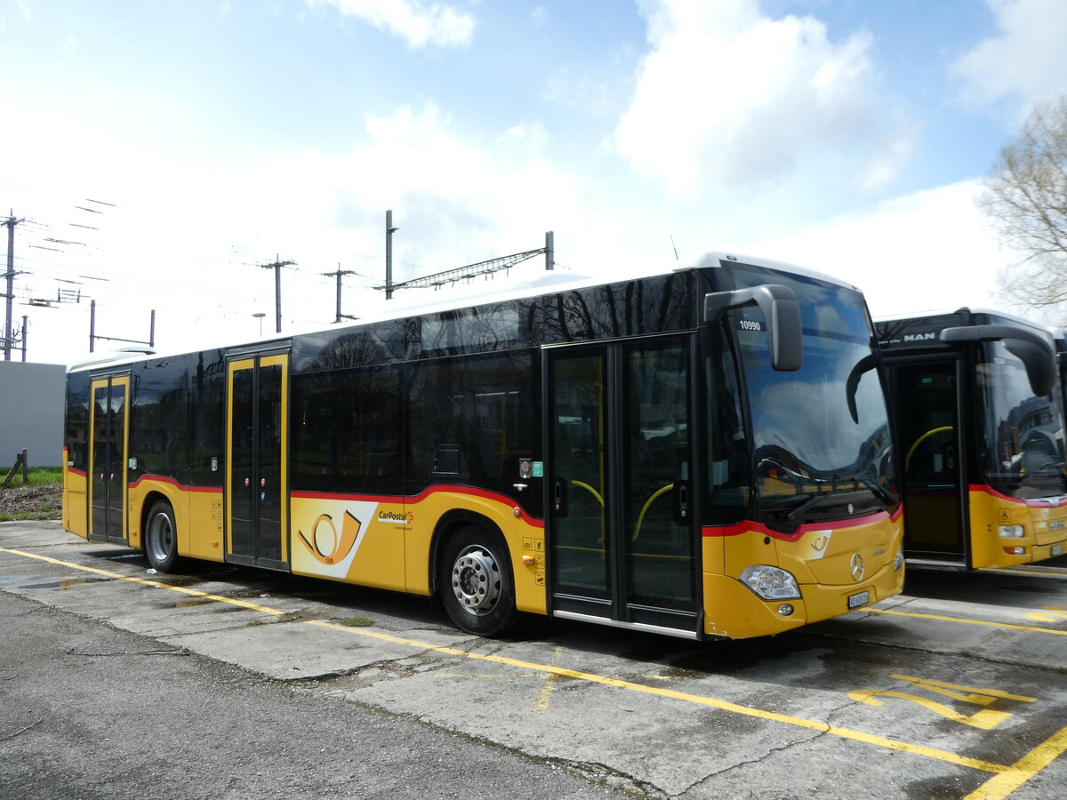 (247'648) - CarPostal Ouest - VD 608'086/PID 10'990 - Mercedes (ex JU 43'870) am 25. Mrz 2023 in Yverdon, Garage