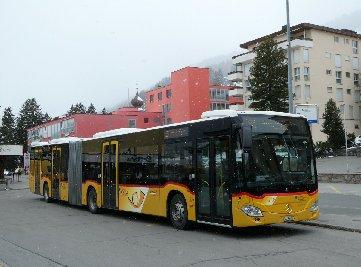 (248'630) - PostAuto Graubnden - GR 56'450/PID 11'590 - Mercedes am 15. April 2023 beim Bahnhof Davos Dorf