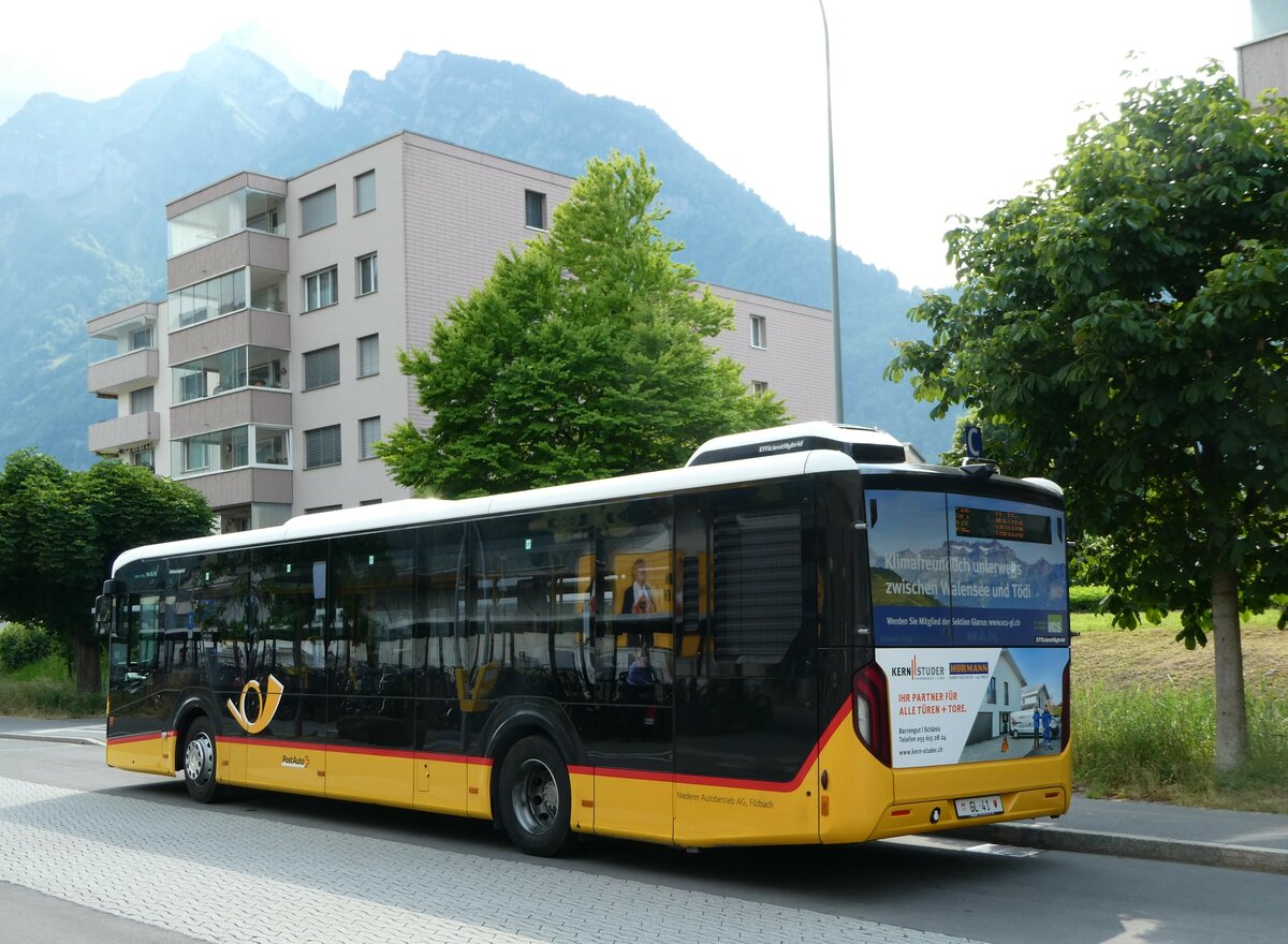 (251'328) - Niederer, Filzbach - Nr. 10/GL 41/PID 11'839 - MAN am 10. Juni 2023 beim Bahnhof Nfels-Mollis