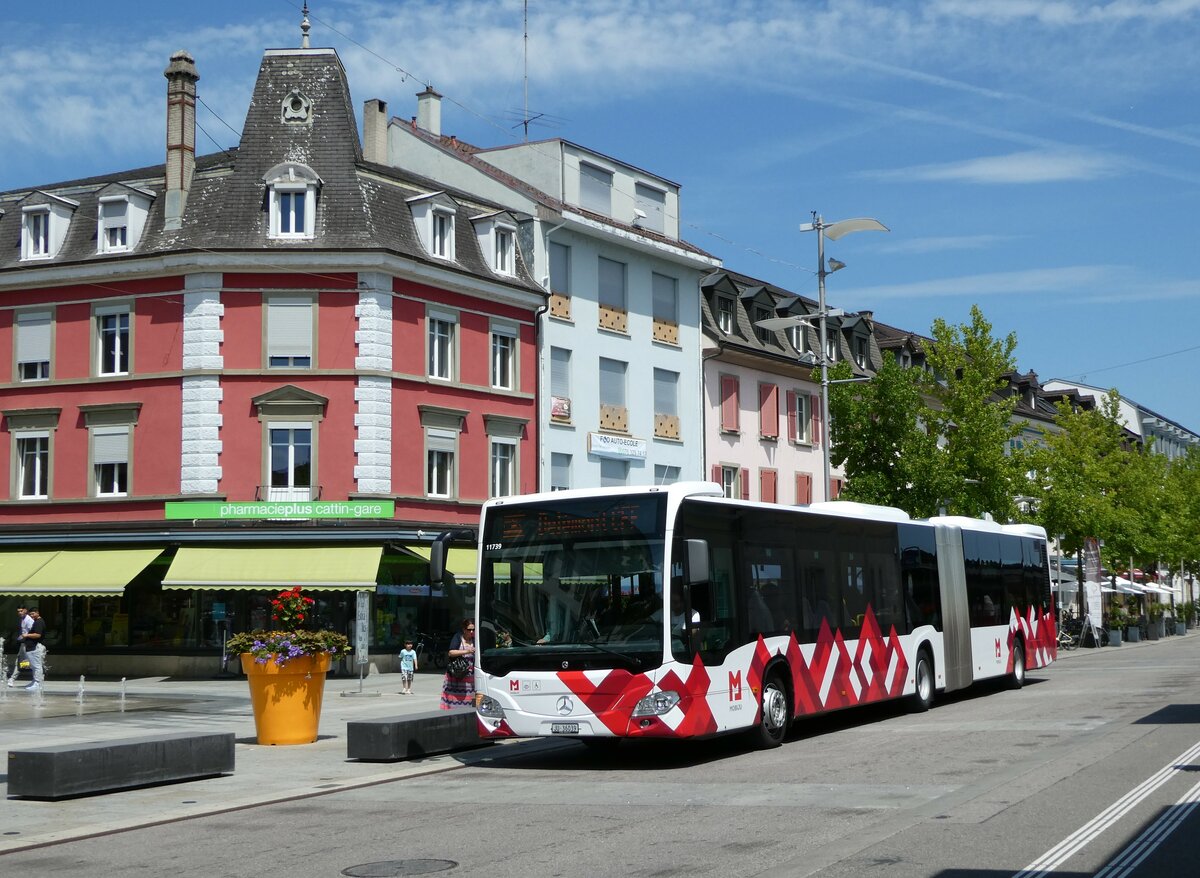 (252'441) - CarPostal Ouest - JU 36'039/PID 11'739 - Mercedes am 7. Juli 2023 beim Bahnhof Delmont