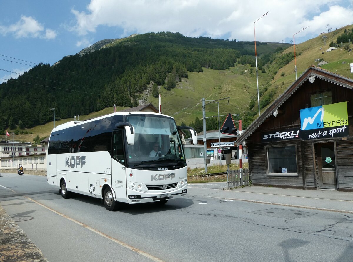 (252'904) - Kopf, Weisslingen - Nr. 21/ZH 704'677 - MAN/Beulas am 23. Juli 2023 beim Bahnhof Andermatt