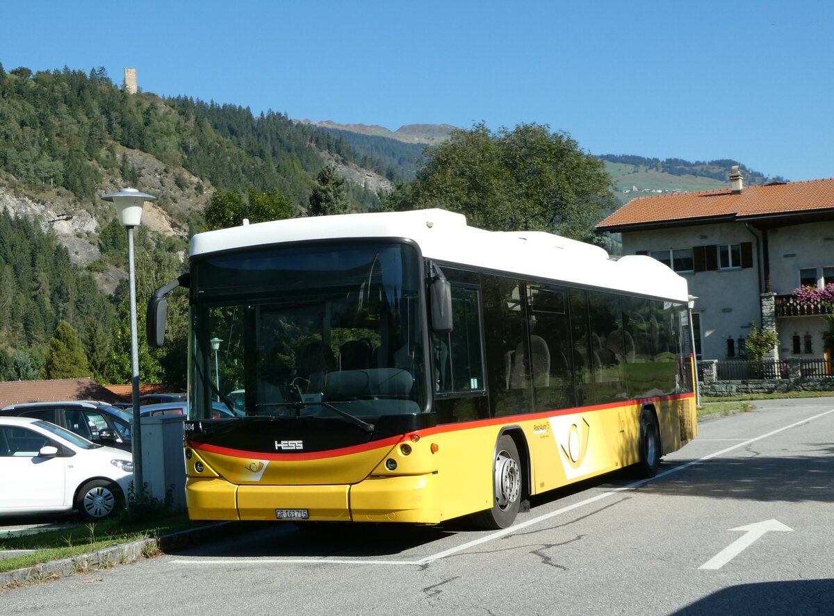 (254'857) - Gaudenz, Andeer - GR 163'715/PID 4804 - Scania/Hess (ex Stutz, Jonen; ex PostAuto Bern; ex AVG Meiringen Nr. 67; ex AVG Meiringen Nr. 76; ex Steiner, Messen) am 8. September 2023 in Andeer, Parkplatz