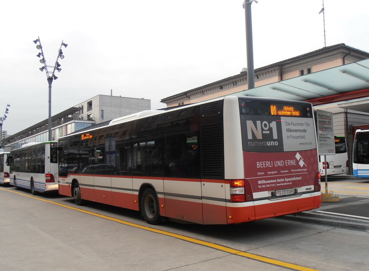 (257'634) - StadtBUS, Frauenfeld - Nr. 710/TG 237'010 - MAN (ex PostAuto Ostschweiz PID 10'034) am 15. Dezember 2023 beim Bahnhof Frauenfeld