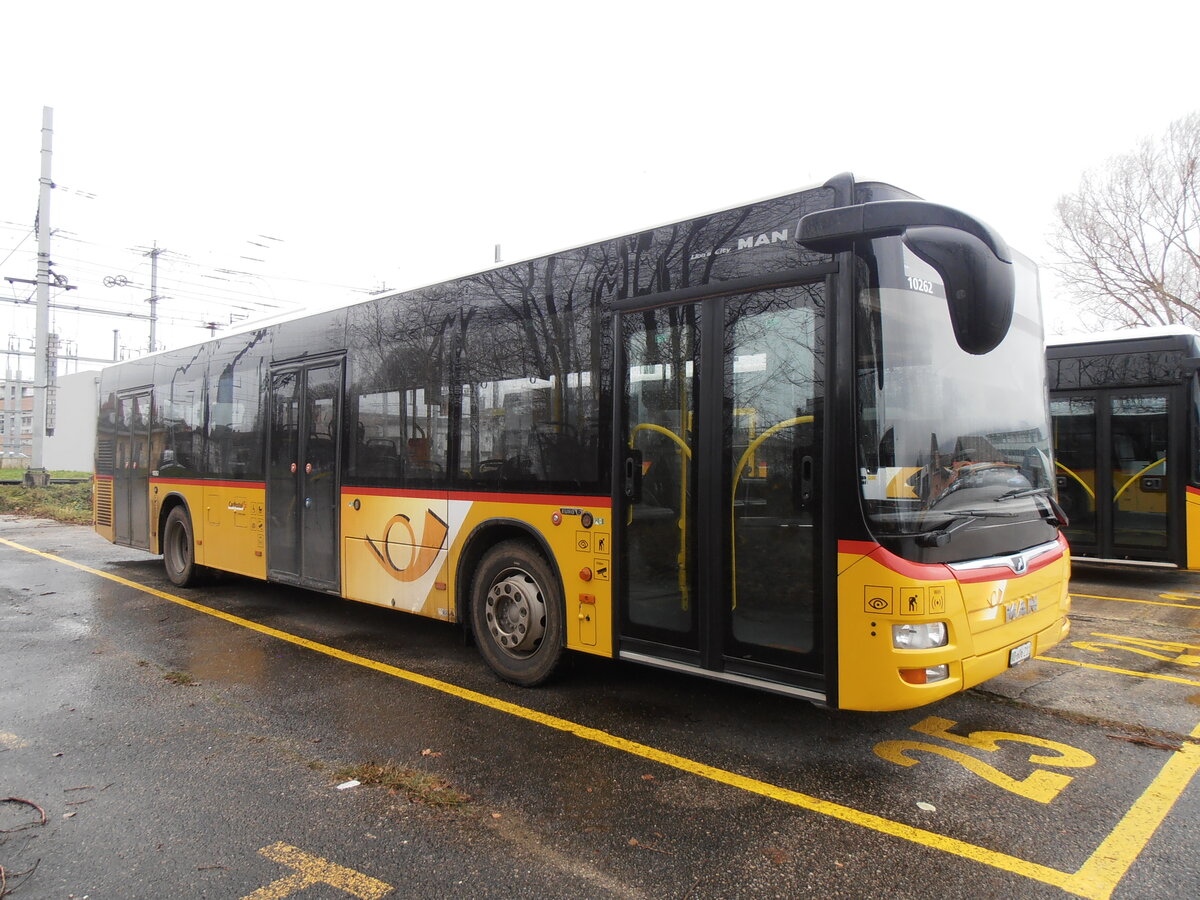 (257'758) - CarPostal Ouest - VD 606'211/PID 10'262 - MAN (ex JU 51'287; ex Nr. 22) am 21. Dezember 2023 in Yverdon, Garage