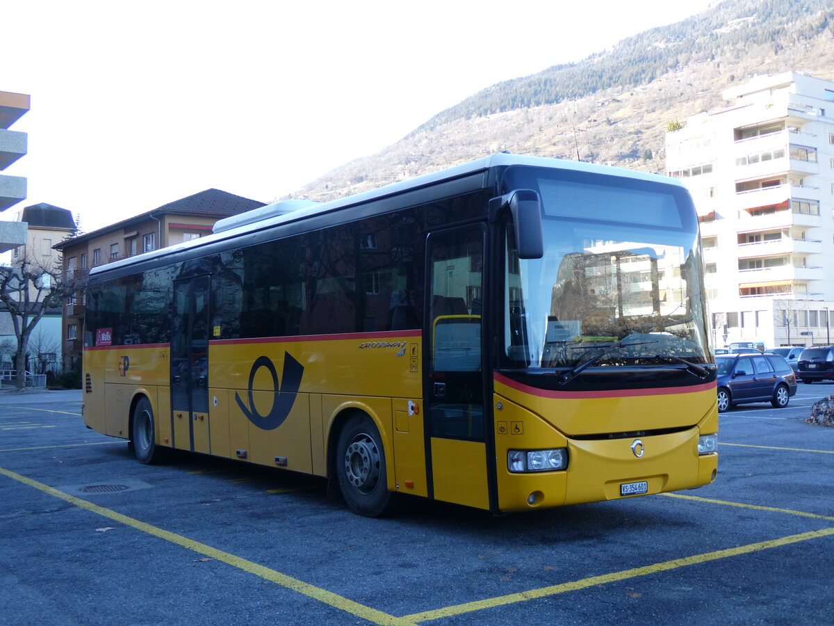 (258'636) - PostAuto Wallis - VS 354'601/PID 5053 - Irisbus am 11. Januar 2024 in Brig, Garage