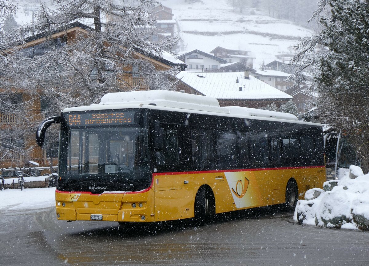 (259'696) - PostAuto Wallis - VS 477'210/PID 10'838 - eEbusco am 27. Februar 2024 in Saas-Fee, Busterminal