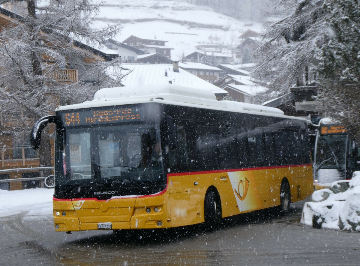 (259'697) - PostAuto Wallis - VS 477'210/PID 10'838 - eEbusco am 27. Februar 2024 in Saas-Fee, Busterminal