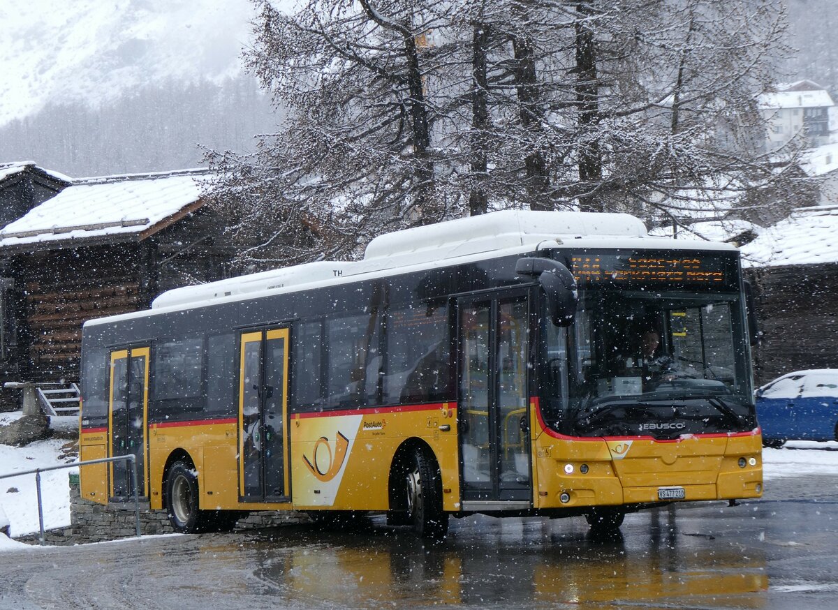 (259'714) - PostAuto Wallis - VS 477'210/PID 10'838 - eEbusco am 27. Februar 2024 in Saas-Fee, Busterminal