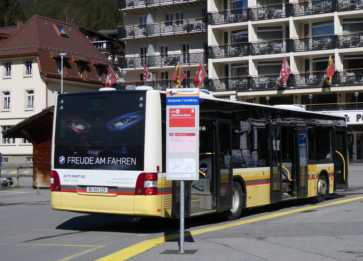 (260'513) - STI Thun - Nr. 129/BE 800'129 - MAN am 19. Mrz 2024 beim Bahnhof Grindelwald