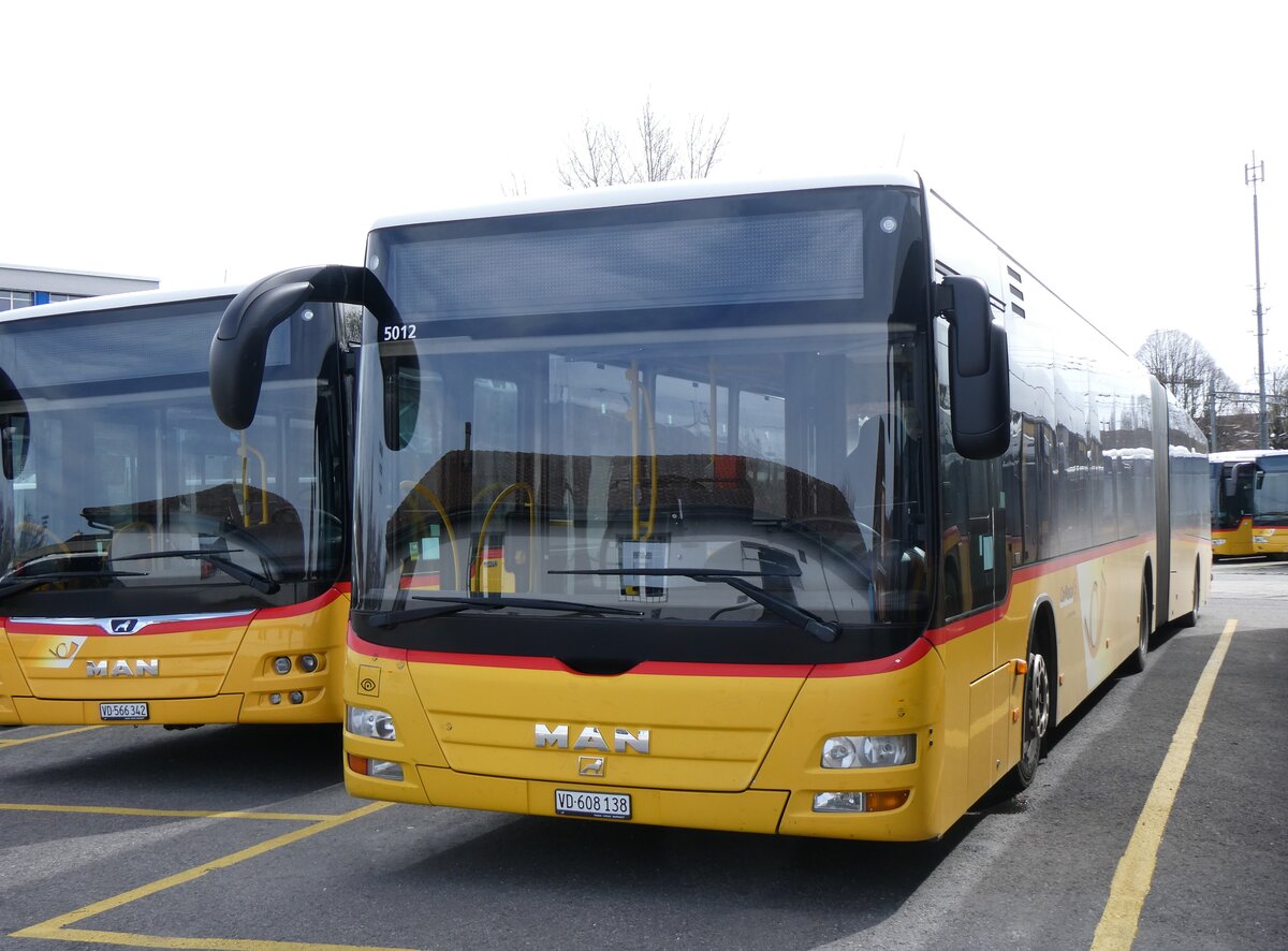 (260'827) - CarPostal Ouest - VD 608'138/PID 5012 - MAN (ex NE 165'376; ex VD 495'042) am 29. Mrz 2024 in Yverdon, Garage