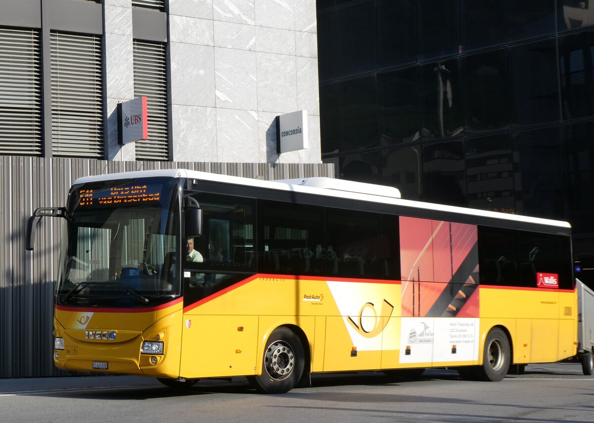 (265'106) - PostAuto Wallis - VS 424'838/PID 10'084 - Iveco am 28. Juli 2024 beim Bahnhof Visp