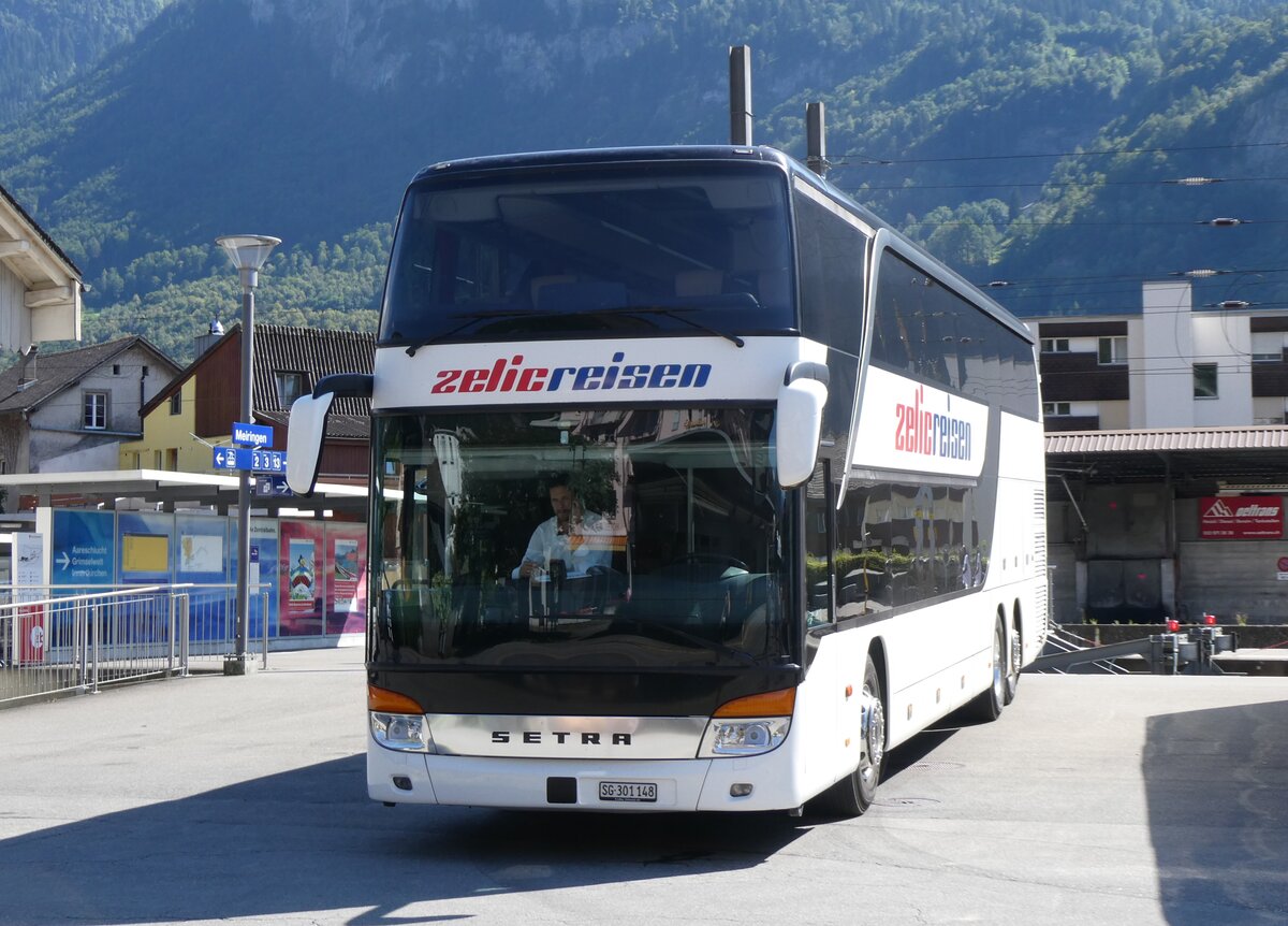 (265'629) - Zelic, Schmerikon - SG 301'148 - Setra am 13. August 2024 beim Bahnhof Meiringen