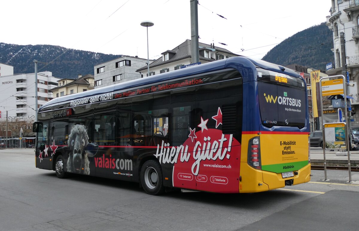 (283'418) - PostAuto Wallis - VS 581'437/PID 12'194 - eMercedes am 23. Dezember 2025 beim Bahnhof Brig