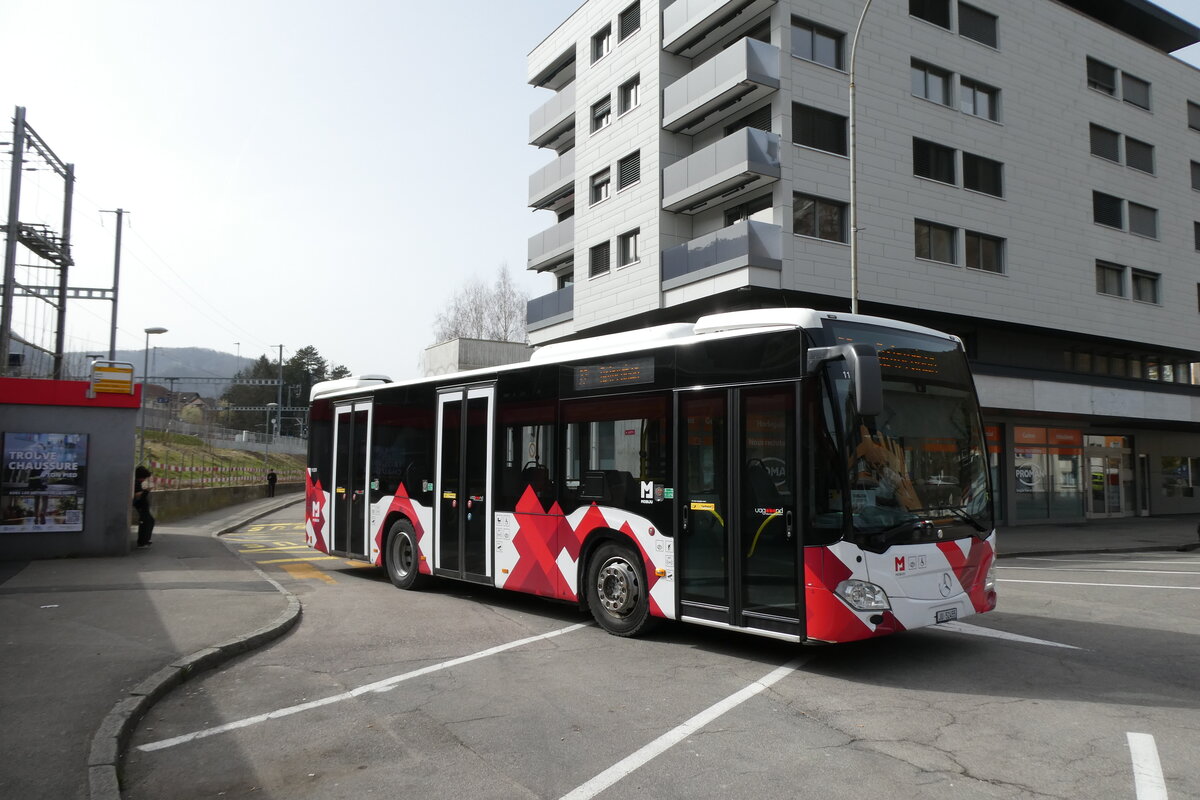 (285'249) - CarPostal Ouest - JU 52'455/PID 11'331 - Solaris am 6. M�rz 2026 beim Bahnhof Moutier